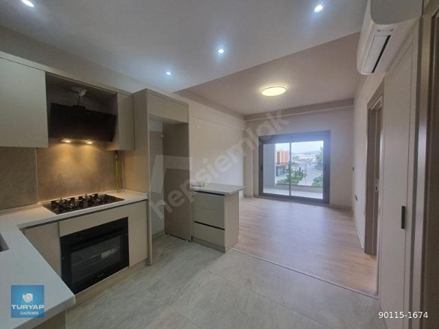 GAZİEMİR TURYAPTAN YERDEN ISITMALI 1+1 SIFIR KİRALIK DAİRE