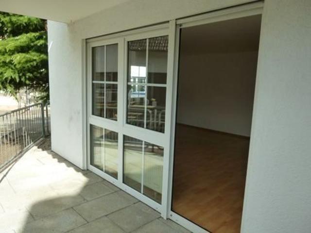 Gemütliche 3 ½ Zimmer EG Wohnung mit Balkon und 2 Tiefgaragenstellplätzen