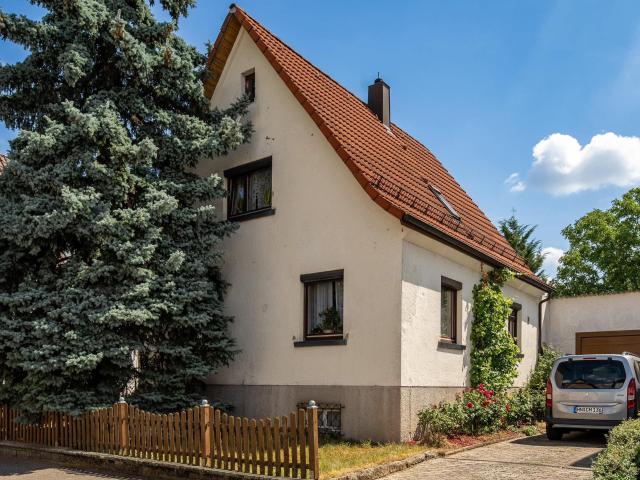 Gemütliches Einfamilienhaus mit großem Garten in attraktiver Lage