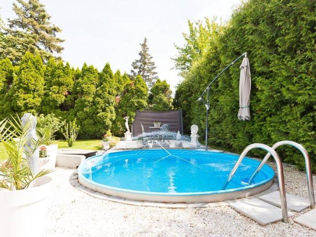 Gemütliches Einfamilienhaus mit liebevollem Garten, Pool, Photovoltaik und LW Pumpe Traiskirchen neuer Preis
