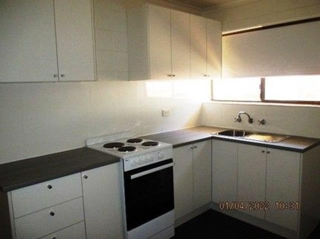 Generous sized two bed unit in walking distance to main street