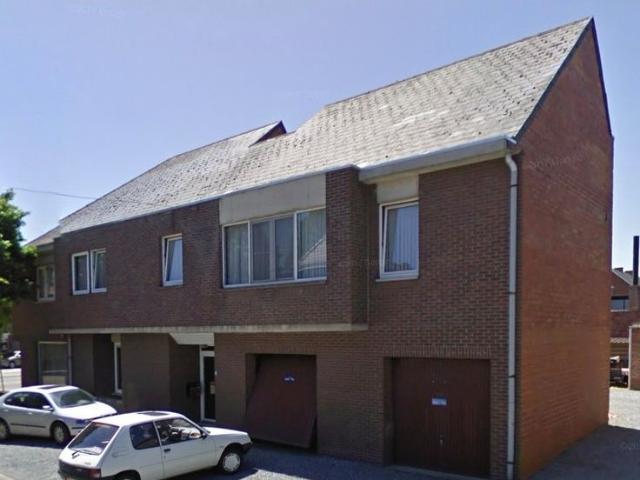 Gebouw met 2 app + handelspand