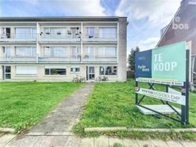 Gelijkvloers 2 slaapkamer appartement met tuin en garage