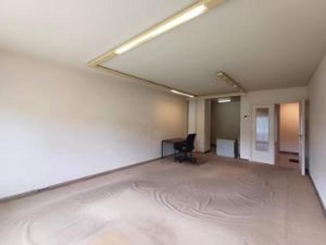 Gelijkvloers appartement met garage