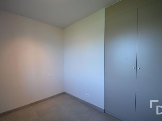 Gelijkvloers appartement met garage en terras