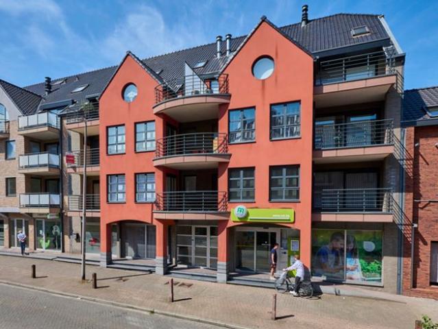 Gelijkvloers appartement met koer en 2 slaapkamers