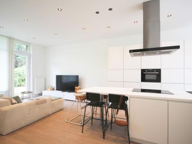 Gelijkvloers appartement met staanplaats en kelder!