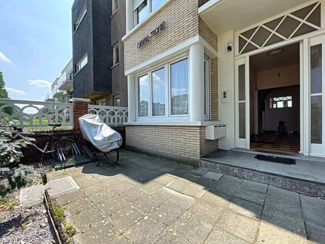Gelijkvloers appartement met tuin