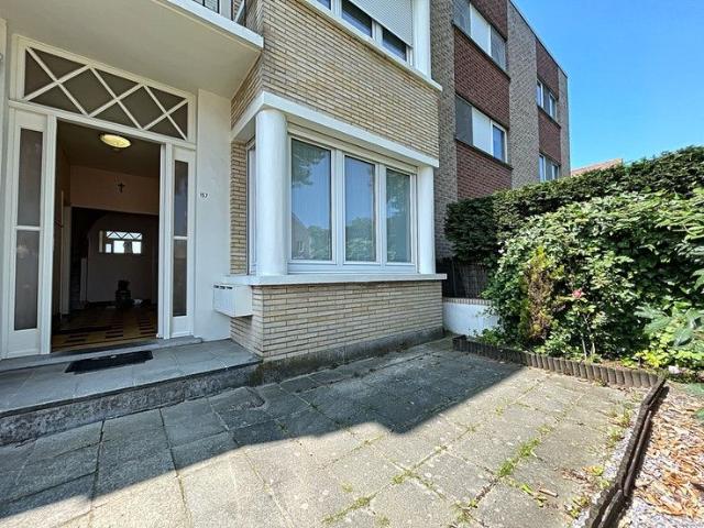 Gelijkvloers appartement met tuin