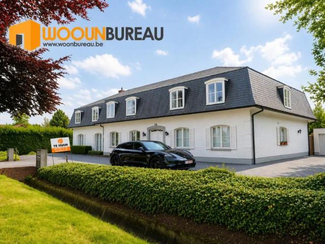Gelijkvloers appartement met tuin en garage te Lokeren