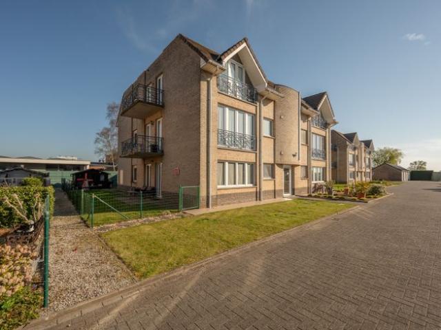 Gelijkvloers appartement met tuin te Oedelem