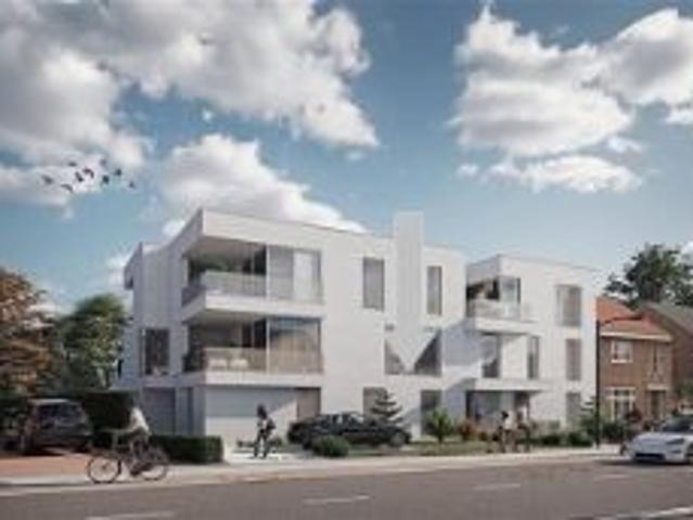 Gelijkvloers appartement met terras en tuintje