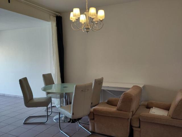 Gelijkvloers appartement nabij het station