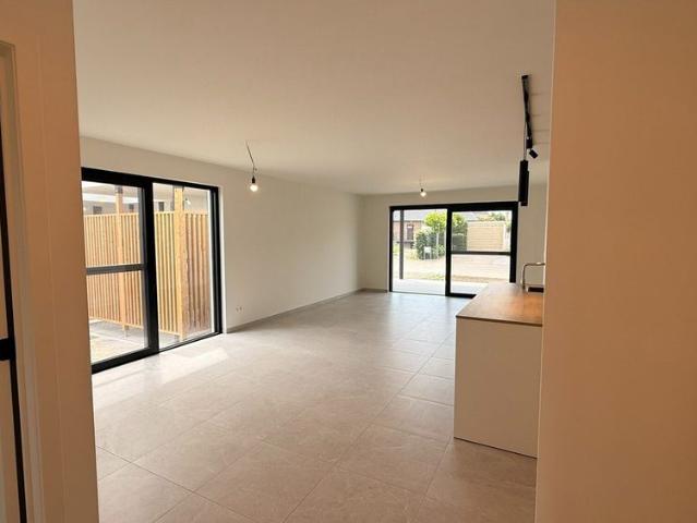 Gelijkvloers nieuwbouwappartement met tuin in Bree
