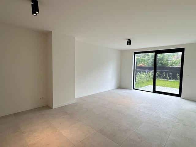 Gelijkvloers nieuwbouwappartement met tuin te huur in Lommel