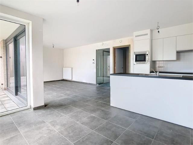 Gelijkvloers nieuwbouwappartement met 1 slaapkamer met terras