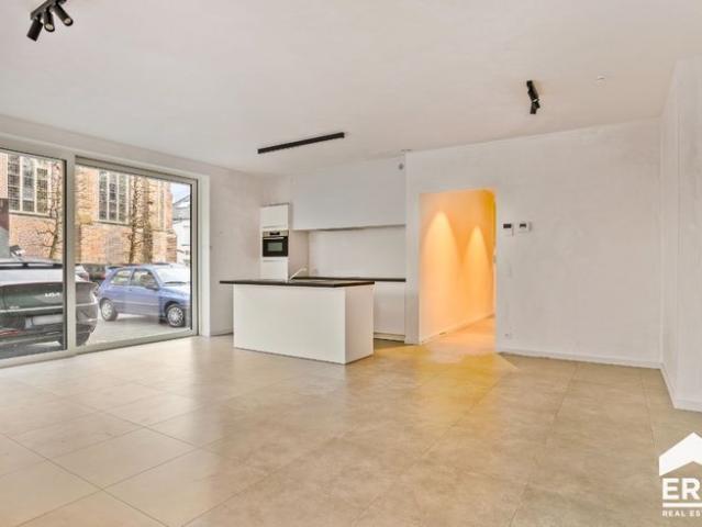 Gelijkvloers nieuwbouwappartement met 2 slaapkamers + garage