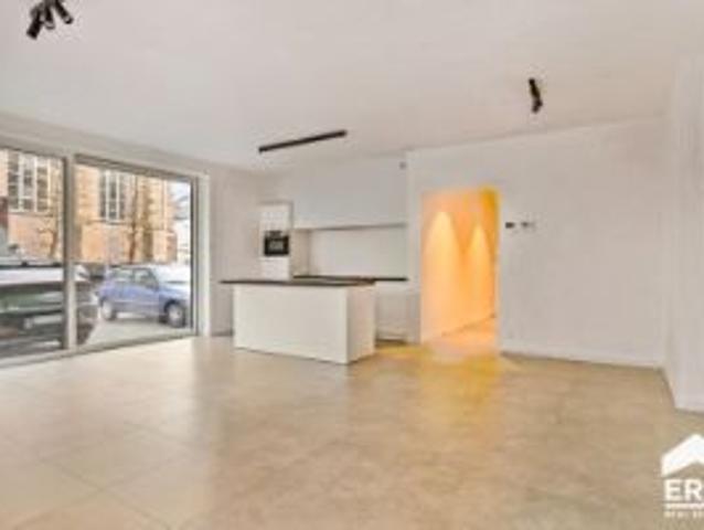 Gelijkvloers nieuwbouwappartement met 2 slaapkamers + garage