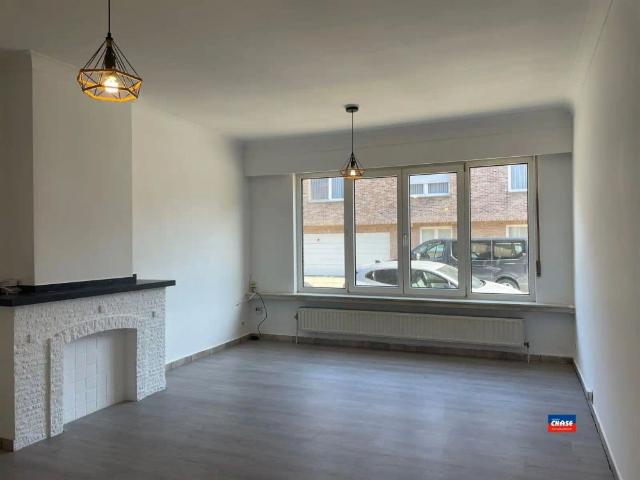 Gelijkvloersappartement met 1 slaapkamer en tuin