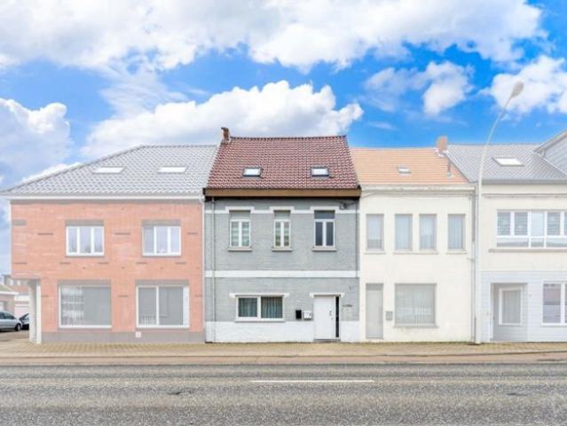 Gelijkvloersappartement met tuin en garage nabij centrum