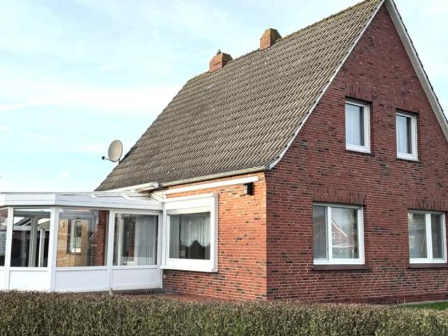 Gepflegt und küstennah: Einfamilienhaus mit Wintergarten, Garage und Garten