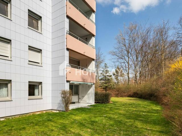 Gepflegte 3 Zimmer Erdgeschosswohnung mit Terrasse und Tiefgaragenstellplatz