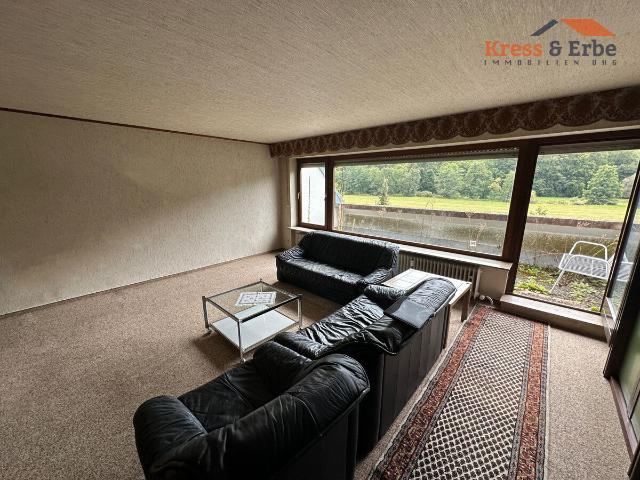 Geräumige 3 Zimmer Wohnung mit Balkon, Parkblick und Tiefgaragenstellplatz in Bad Brückenau