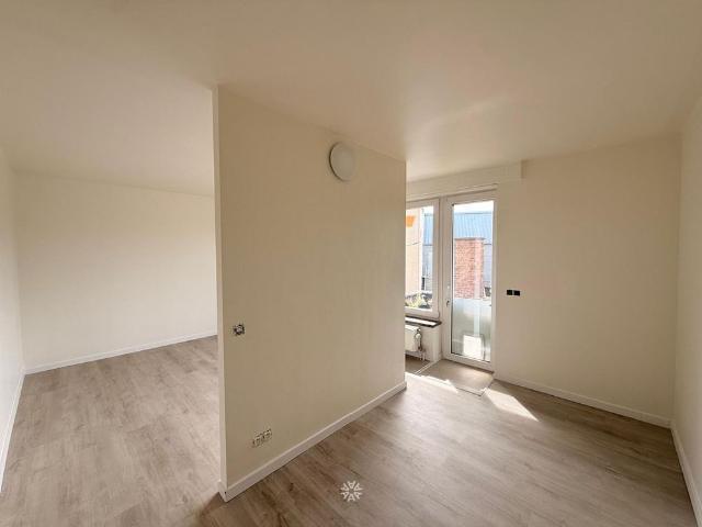 Gerenoveerd appartement met 2 slaapkamers en terras