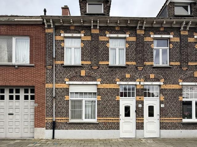 Gezellige rijwoning met 3 slaapkamers en tuin te centrum Ro
