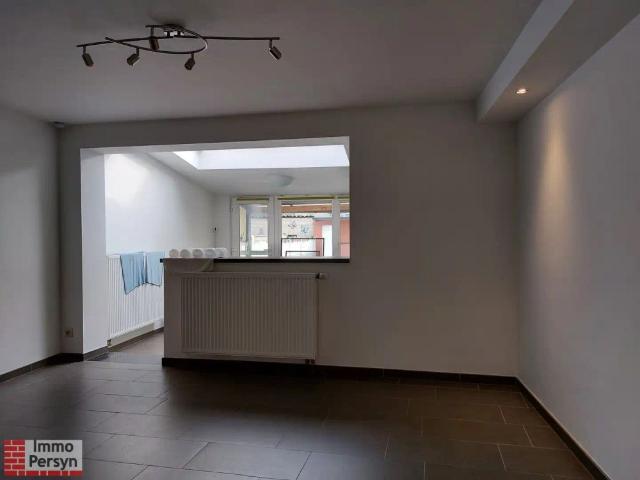 Gezellige rijwoning met kleine stadstuin