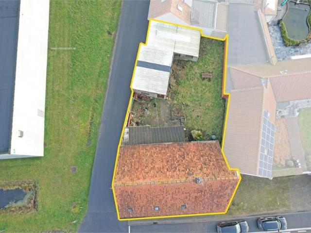 Gezellige woning te koop in Hoogstade met zongerichte tuin en zijtoegang