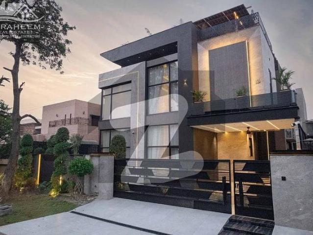 Gift for genuine buyer 24 marla brand new ultra modern full basement fully furnished palace with indoor swimming pool plus lift, home cenima and rooftop for sale in dha phase 6 near to raya