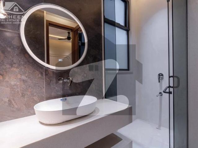 Gift for genuine buyer 24 marla brand new ultra modern full basement fully furnished palace with indoor swimming pool plus lift, home cenima and rooftop for sale in dha phase 6 near to raya dha phase 6
