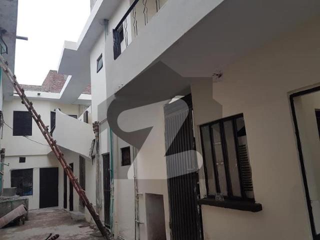 Girls Hostel Building For Sale with 70 rooms attach bath room Rental income 5 laks Chungi No 6