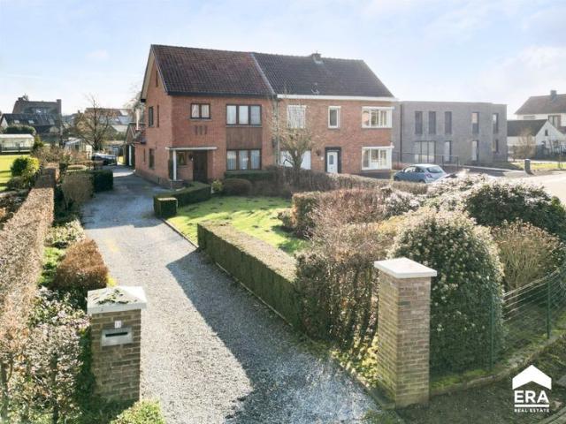 Goed onderhouden gezinswoning met tuin vlakbij centrum