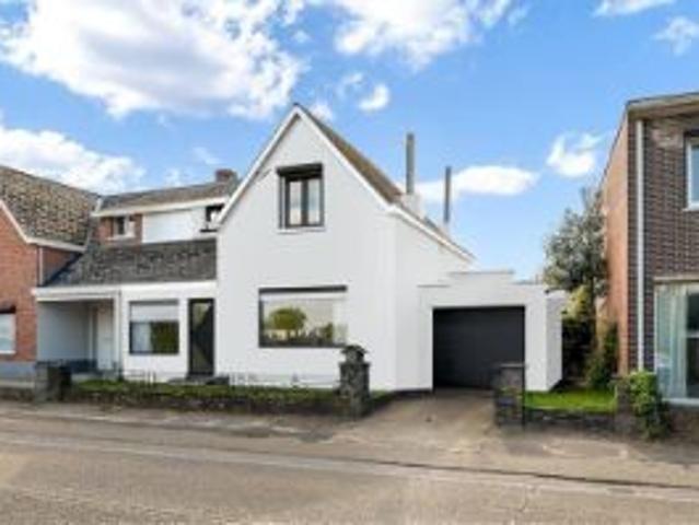 GOED ONDERHOUDEN WONING MET GARAGE EN TUIN OP IDEALE LIGGING