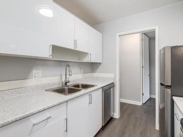 Glenmore Gardens Coach Homes 2 Bedroom Home for Rent at 2105 90 Ave Sw, Calgary, AB T2V 0X5 Palliser