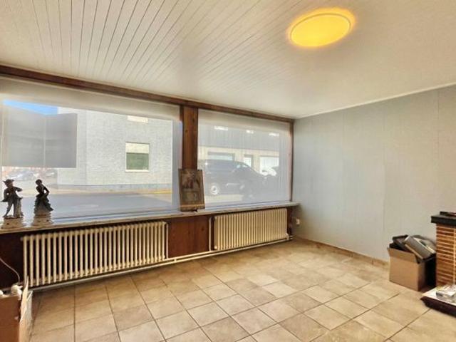 Grote woning met 3 kamers, garage en stadstuin
