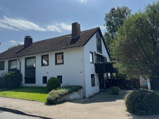 Großzügige 4 Raum Wohnung mit Terrasse, Garten und Garage in ruhiger Lage