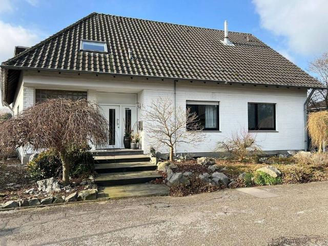 Großzügige Eigentumswohnung im Erdgeschoss mit Garten und Garage im Herzen von Wesel Flüren