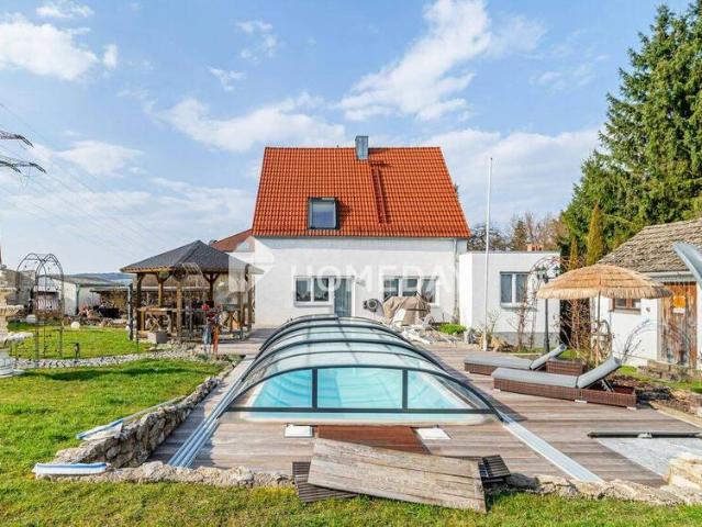 Großzügiges Einfamilienhaus mit weitläufigem Garten, Pool und durchdachter Raumaufteilung
