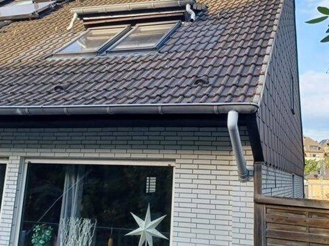 Großzügiges Familiendomizil mit 2 Süd Balkonen und großem Garten