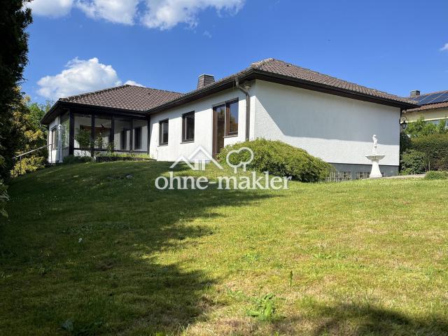 Großzügiges Wohnen auf einer Ebene ! Massivbau Winkelbungalow in Waldrandlage auf Traumgrundstück