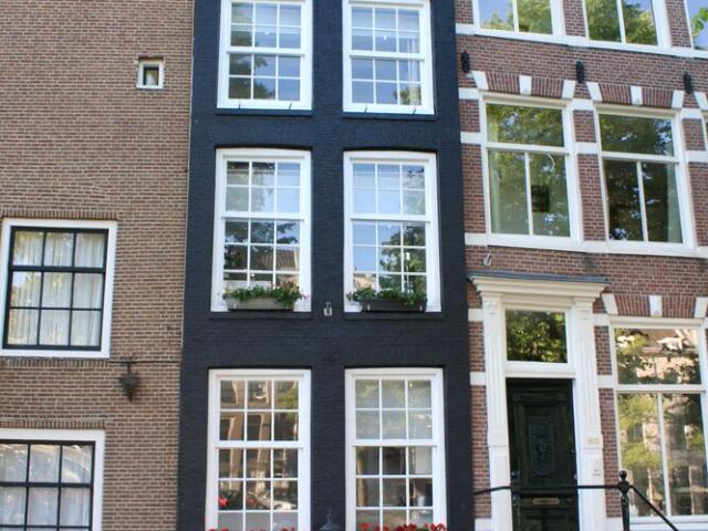 Grachtenpand, tussenwoning te huur in Amsterdam