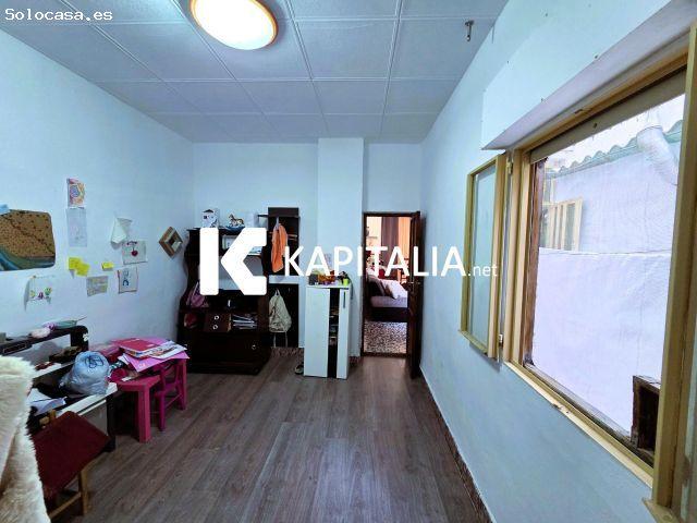 Gran casa a la venta en planta baja con patio y buhardilla