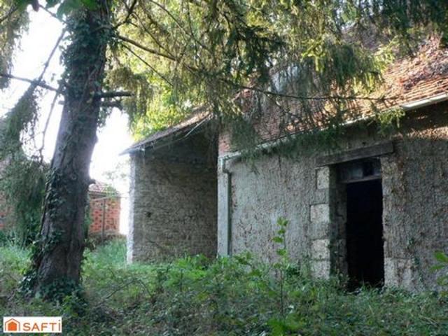 Grange en pierre à rénover sur terrain arboré de plus de 1000m2 à 5 minutes de Beaune La Rolande