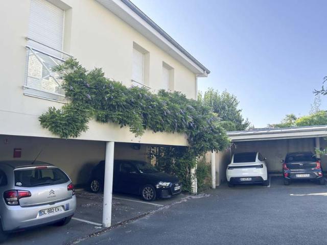 Grand T3 avec jardin à usage privatif et place de stationnem