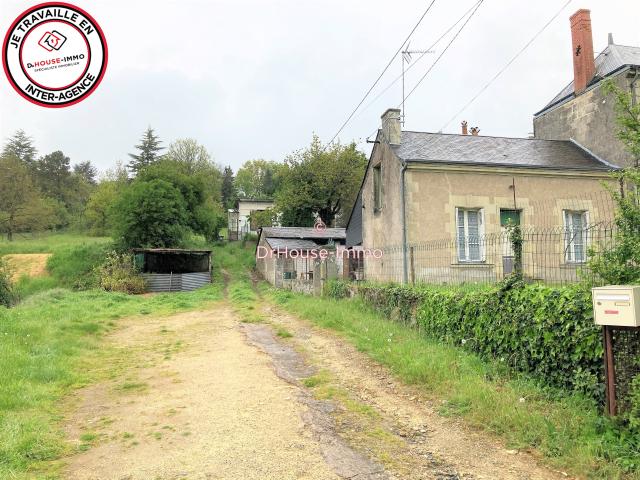 Grand terrain en partie constructible avec 2 habitations et petites dépendances