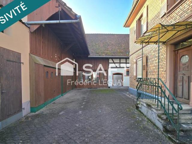 Grande maison avec multiples possibilités d'explotation