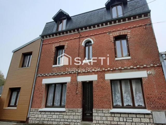 Grande maison familiale avec patio, garage double et atelier